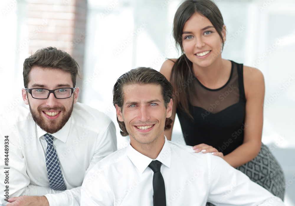 young business colleagues in the background of the office young business colleagues in the background of the office