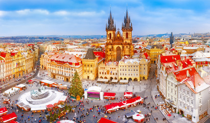 Prague. Panoramic aerial view of Chrismtas market. Seasonal winter scenery in sunny day.