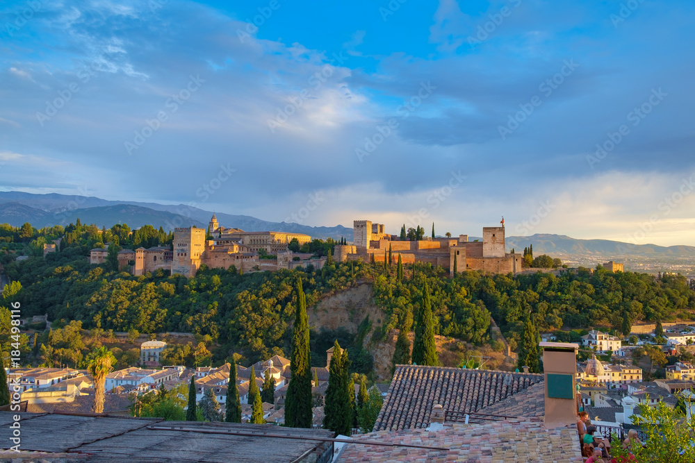 The Alhambra, Granada, Spain. A medieval complex of palaces and gardens within an Alcazaba or defensive stone wall. The Alhambra, Granada, Spain. A medieval complex of palaces and gardens within an Alcazaba or defensive stone wall.