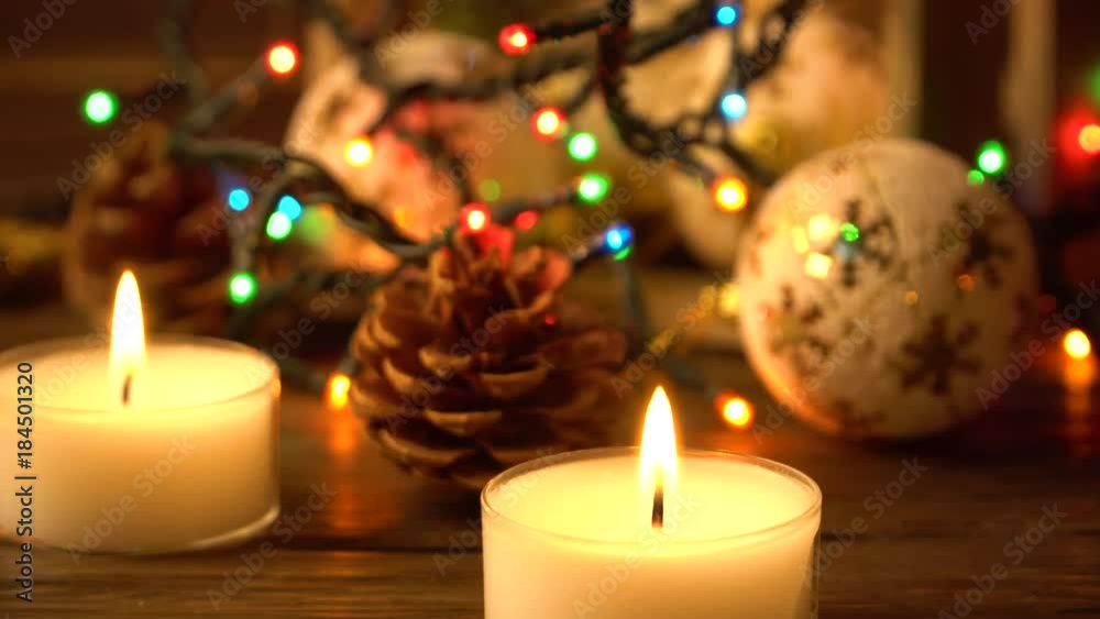 Video of a christmas ornament with lights and candles Video of a christmas ornament with lights and candles
