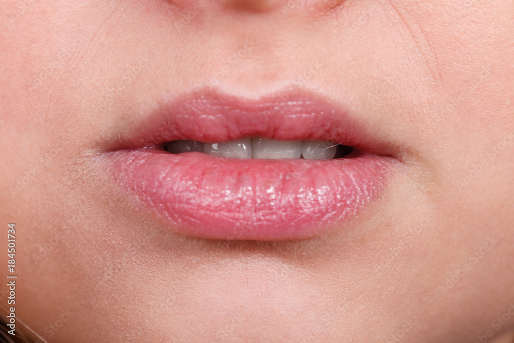 Naklejka premium Closeup of woman lips without makeup