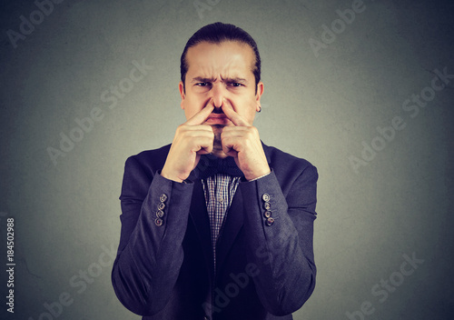 Obraz na płótnie Man suffering from bad smell