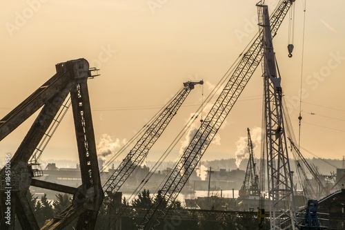 Cranes and urban landscape in this Industrial city sunrise