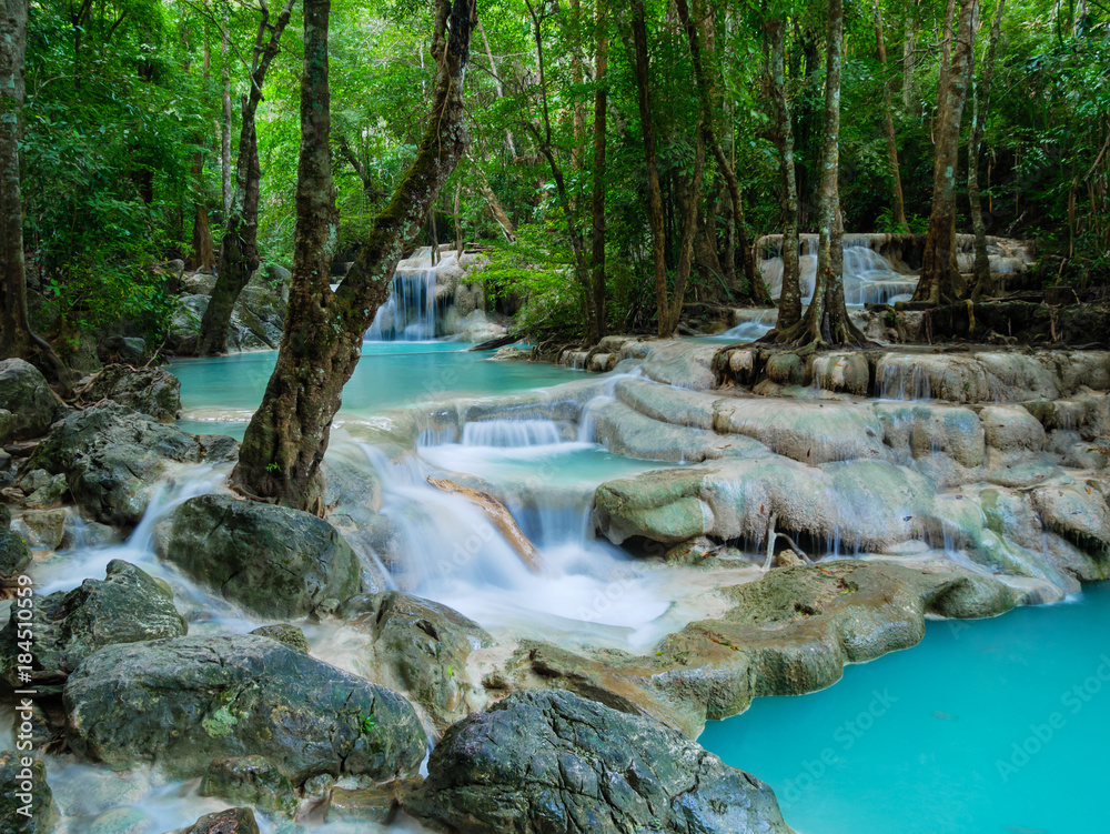 Naklejka premium Deep forest waterfall in Thailand (Erawan Waterfall).