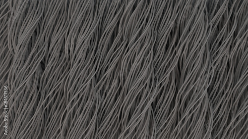 Twisted aluminum wires on black surface