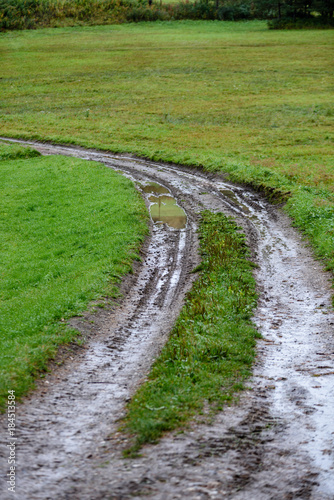 empty road in the countryside in summer. gravel surface