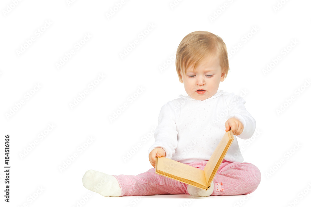 Caucasian baby girl holding a book isolated on white background Caucasian baby girl holding a book isolated on white background