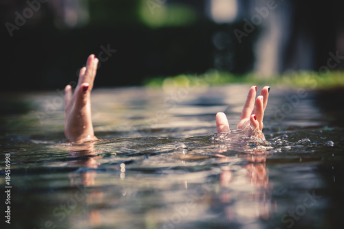 Young asian fat woman drowning in swimming pool help me please helping concept.