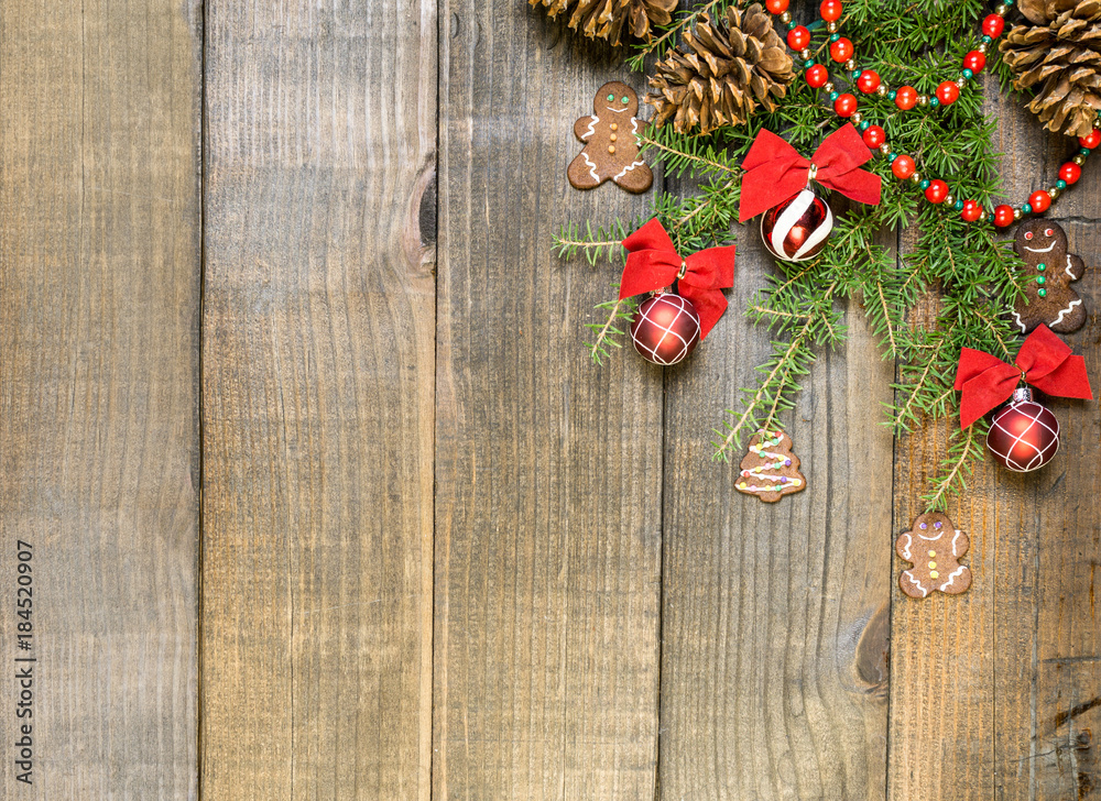 Christmas decorations and fir branches on wooden board background with copy space. Christmas decorations and fir branches on wooden board background with copy space.