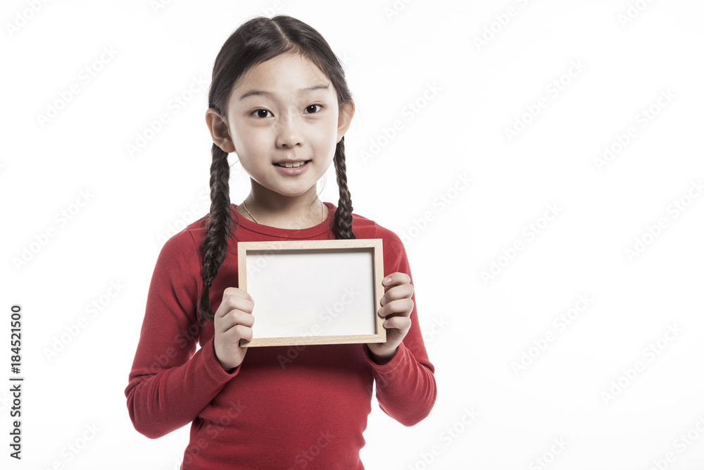 girl(kid) hand hold a photo frame isolated on the white background. girl(kid) hand hold a photo frame isolated on the white background.