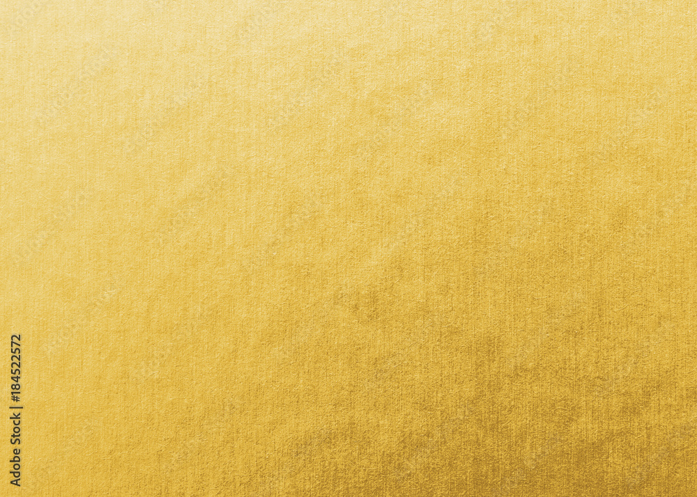 Gold foil leaf metallic wrapping paper shiny texture background for Christmas and holiday wall paper decoration element Gold foil leaf metallic wrapping paper shiny texture background for Christmas and holiday wall paper decoration element