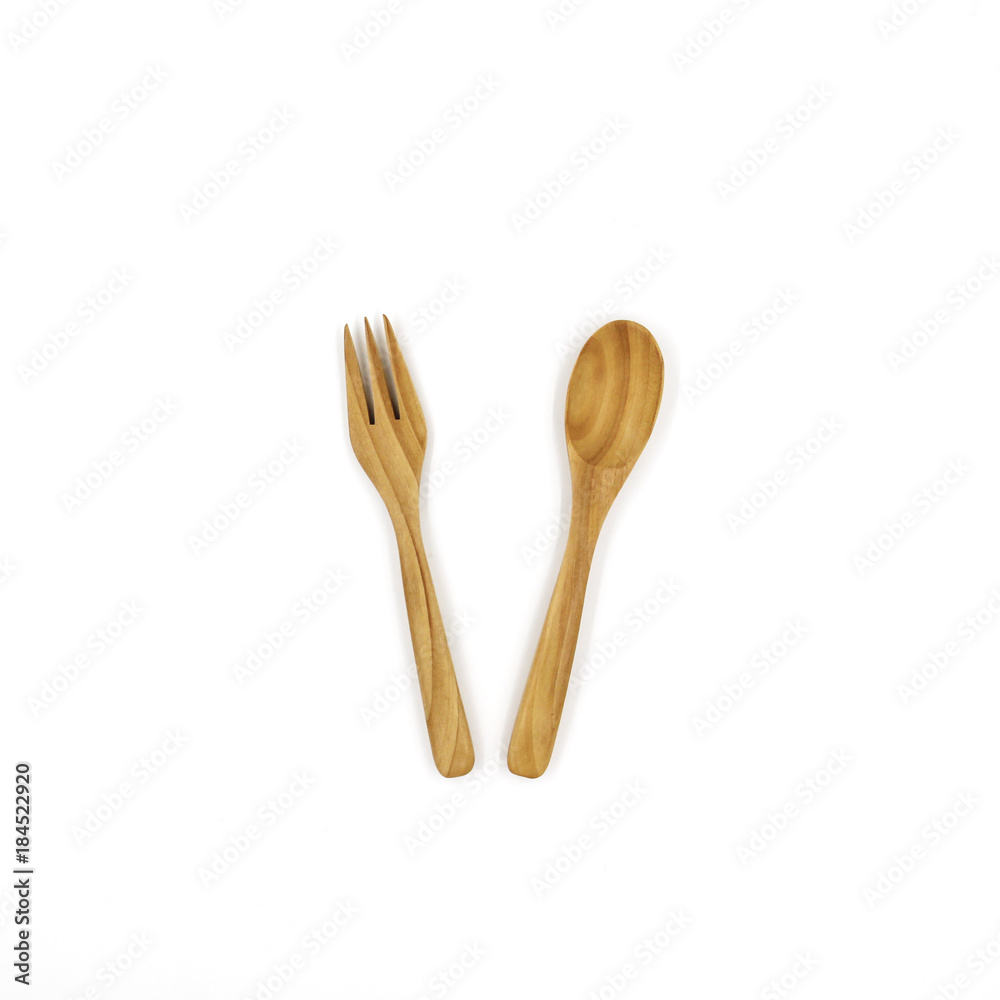 Wooden spoon and fork isolated on white background. Wooden spoon and fork isolated on white background.