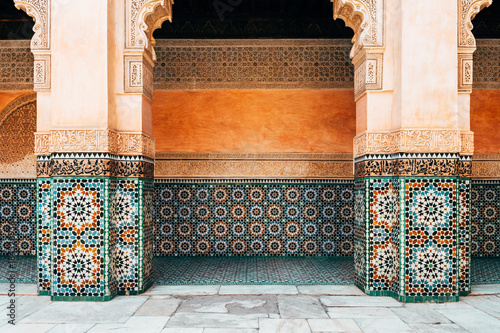 colorful ornamental tiles at moroccan courtyard photo