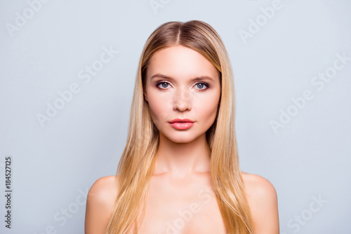 Concept of having natural beauty. Close up portrait of confident beautiful charming cute lovely attractive woman with perfect ideal skin, face, lips, isolated on grey background, copyspace