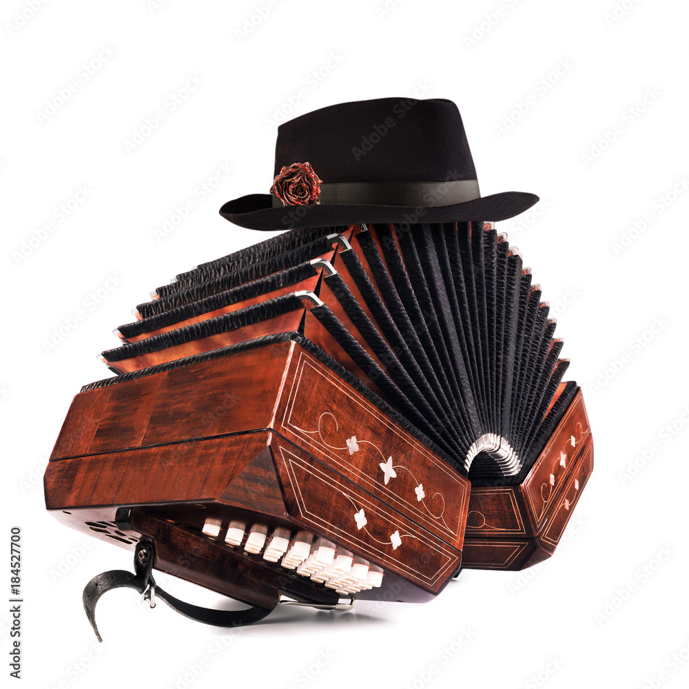 Bandoneon, tango instrument with a male hat on top on white Stock-Foto |  Adobe Stock