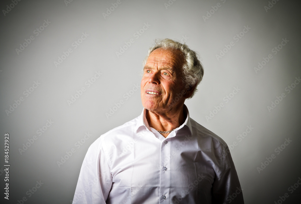 Strongman. Old man in white Strongman. Old man in white