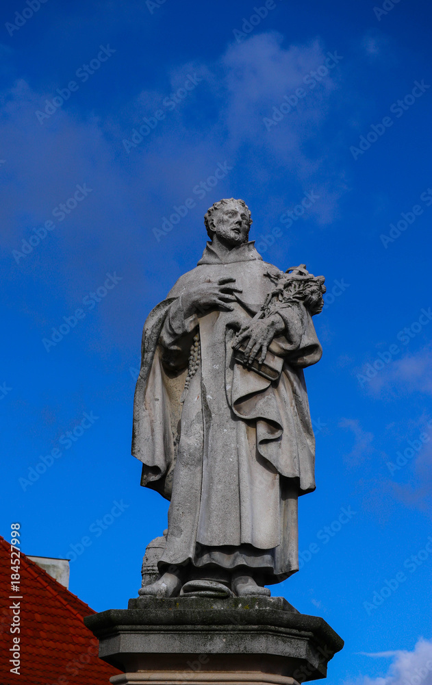 Czech, Prague, gothic sculpture of the of Philip Benizi de Damiani on the Charles bridge. Prague, medieval art, statue of Saint on the bridge of King Charles.
