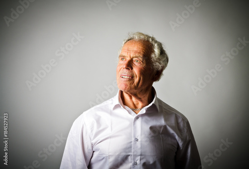 Strongman. Old man in white © Marijus