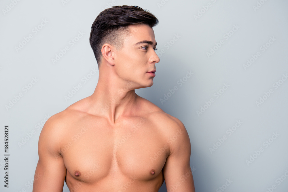 Profile side view half-faced photo of handsome sexy athletic confident focused young sporty guy with flawless ideal skin, isolated on grey background, copyspace Profile side view half-faced photo of handsome sexy athletic confident focused young sporty guy with flawless ideal skin, isolated on grey background, copyspace