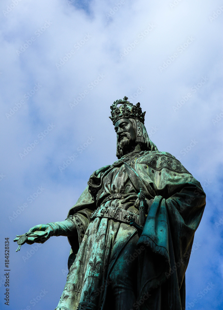 Statue of King Charles, Prague, on a blue sky background. Monument sculpture of the Czech King Charles 4 Statue of King Charles, Prague, on a blue sky background. Monument sculpture of the Czech King Charles 4