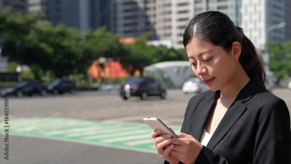 business lady using smartphone texting business lady using smartphone texting