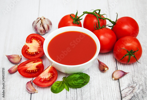 Bowl with tomato sauce