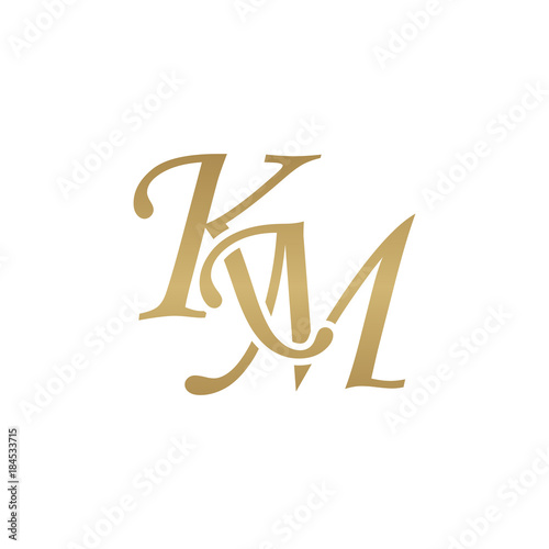Initial letter KM, overlapping elegant monogram logo, luxury golden color photo