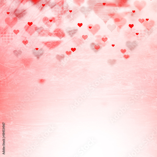 Beautiful blurry heart symbols on abstract bright grunge textured illustration background with place for text.