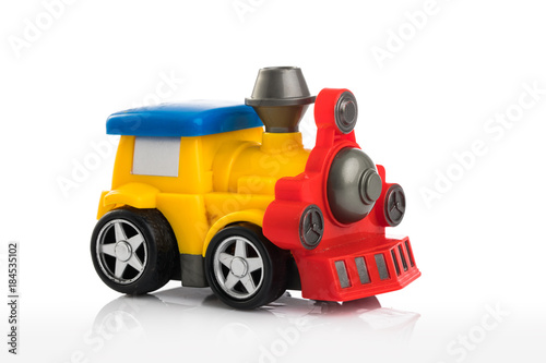 Colorful plastic toy train isolated on white background