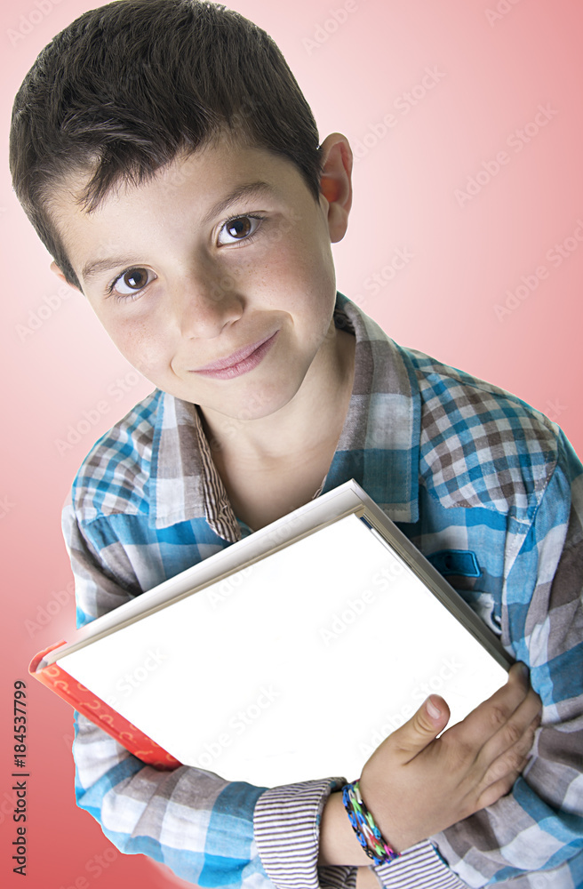 Portrait of a happy schoolboy isolated on a studio background Portrait of a happy schoolboy isolated on a studio background