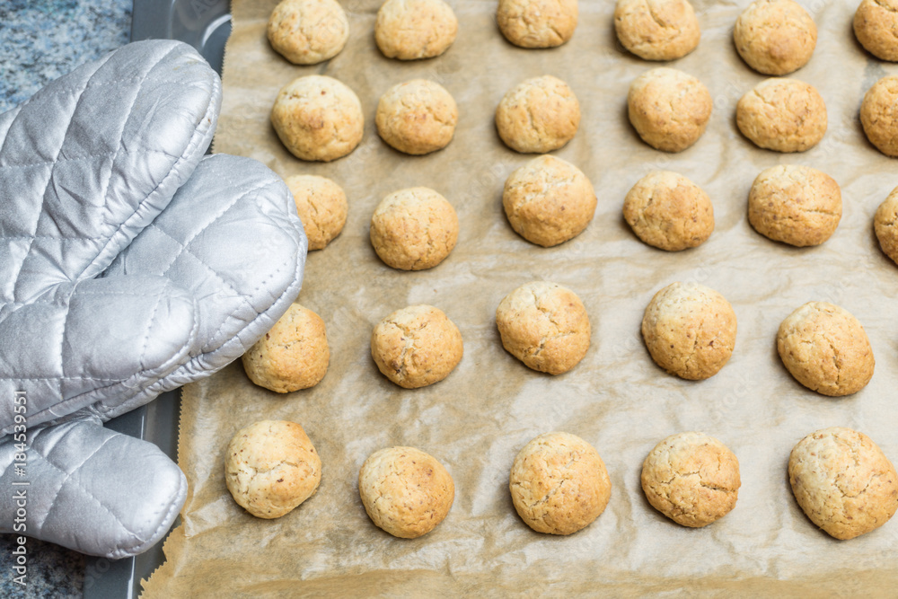 Fresh bakened Christmas nut cookies on baking tray Fresh bakened Christmas nut cookies on baking tray