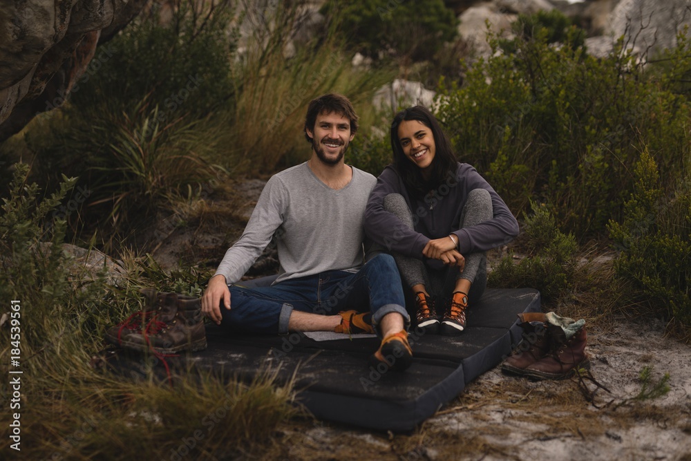 Portrait of happy couple relaxing on mattress Portrait of happy couple relaxing on mattress