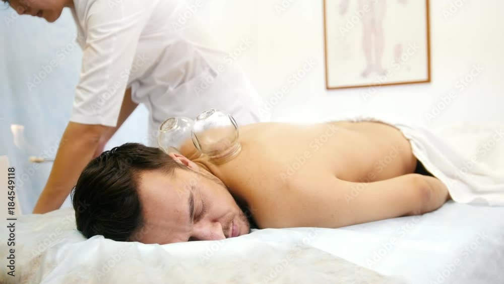 Alternative Asian Tibetan medicine, treatment using glass jars Alternative Asian Tibetan medicine, treatment using glass jars