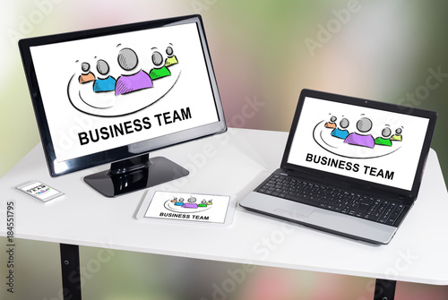 Business team concept on different devices