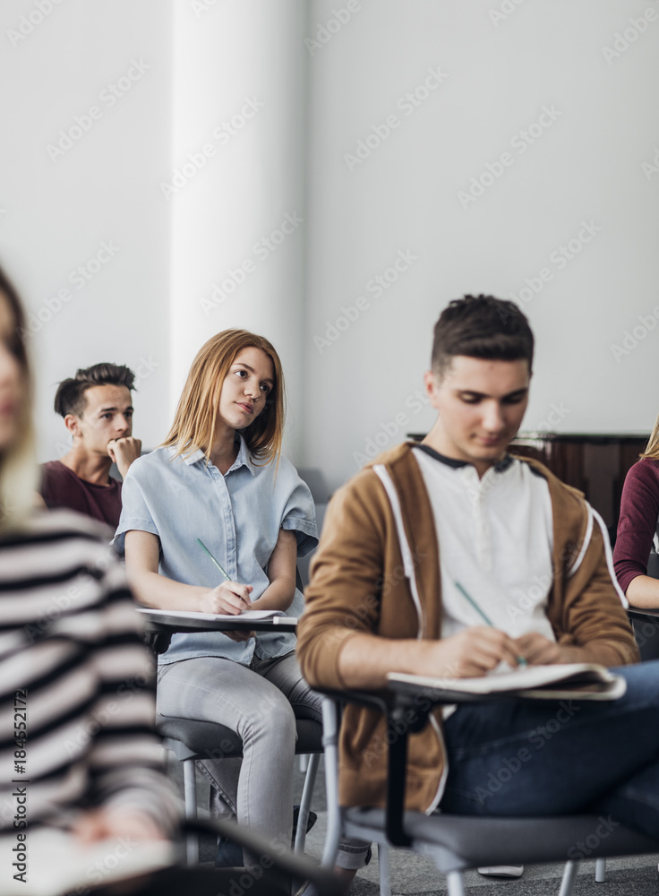 Students Taking Notes at Class Students Taking Notes at Class