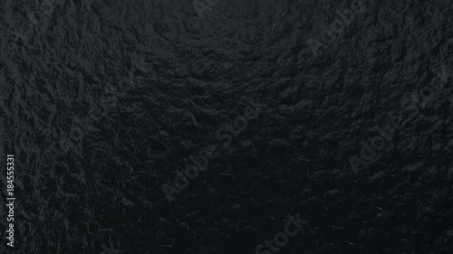 Dark water animation. Background texture of empty ocean surface from above with copy space.
