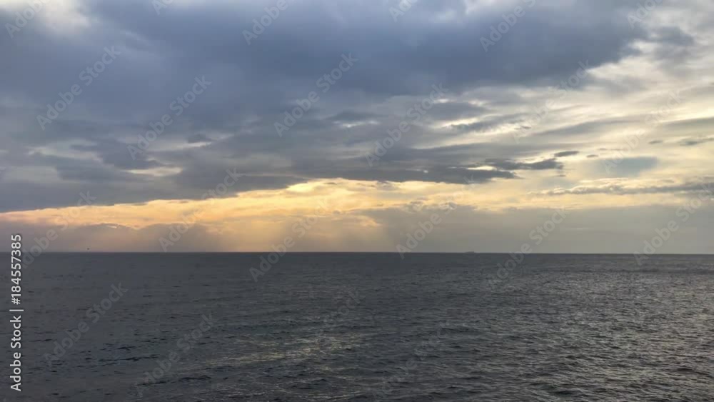 Beautiful sunset over the sea on a cloudy day Beautiful sunset over the sea on a cloudy day