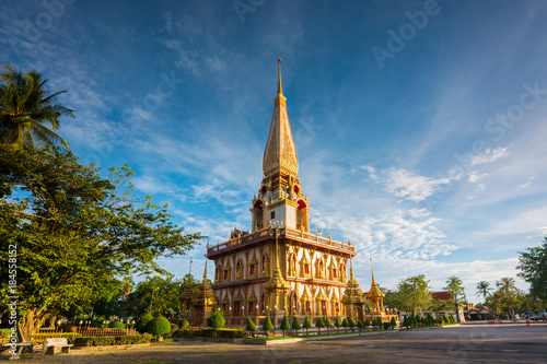 Wat Chalong or Chalong temple the most popular tourist attractions in phuket thailand with sun light . photo