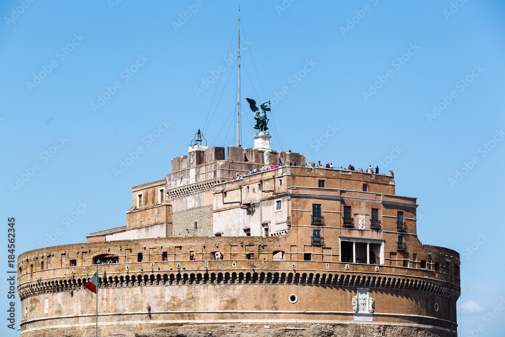 Tourists are admire the panorama of Rome from a height of the observation deck at the top of Saint Angel Castle, Italy, Sunny summer day