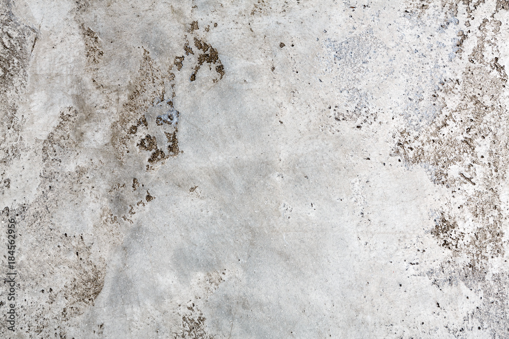 Naklejka premium Textured surface of old building wall with stains