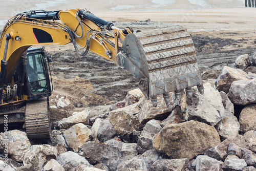 pelleteuse en action sur le chantier photo