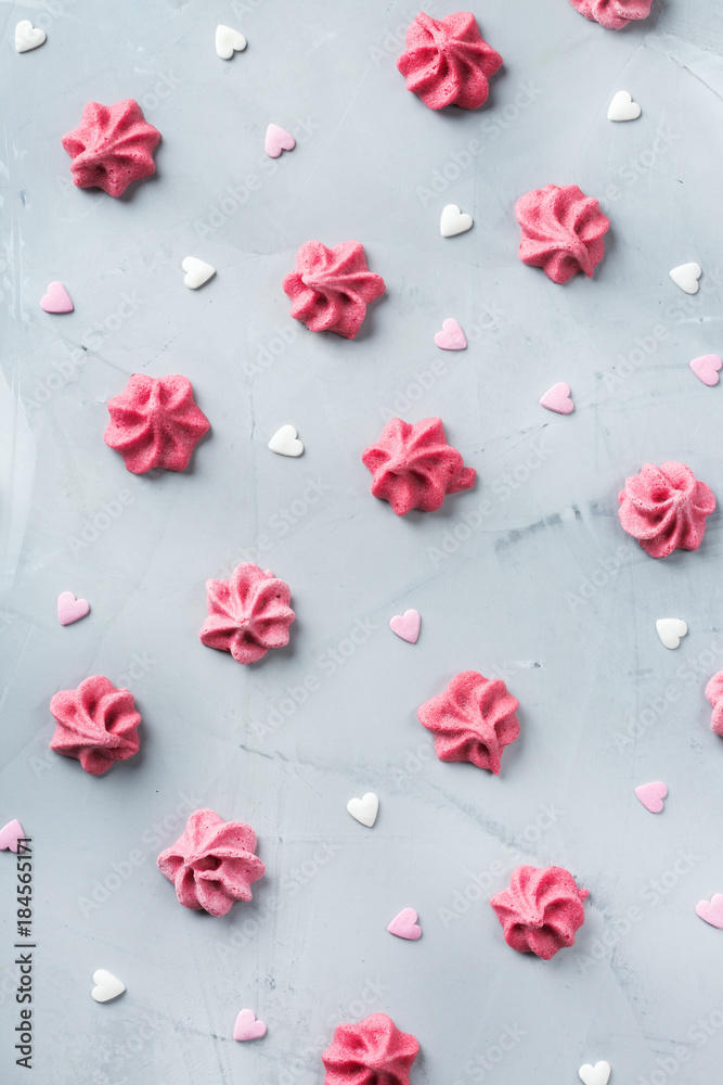 Fototapeta premium Valentines day holiday love concept with pink meringue and hearts