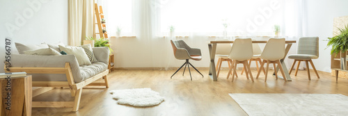 White rug in dining room