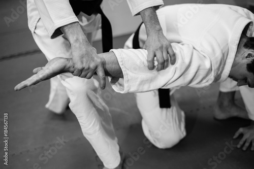 Fight between two aikido fighters photo