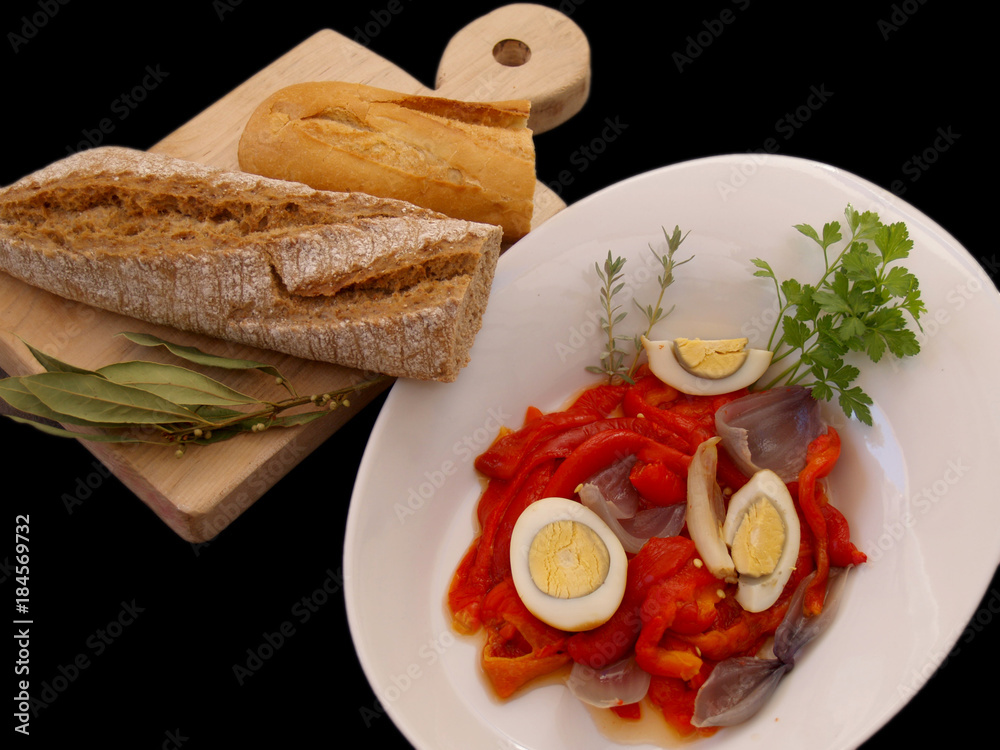 tray with peppers salad and kitchen board with bread tray with peppers salad and kitchen board with bread