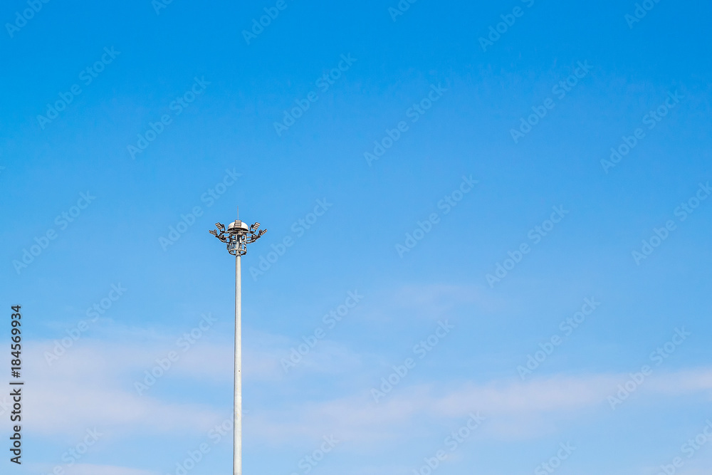 light pole tower in sport arena on blue sky light pole tower in sport arena on blue sky