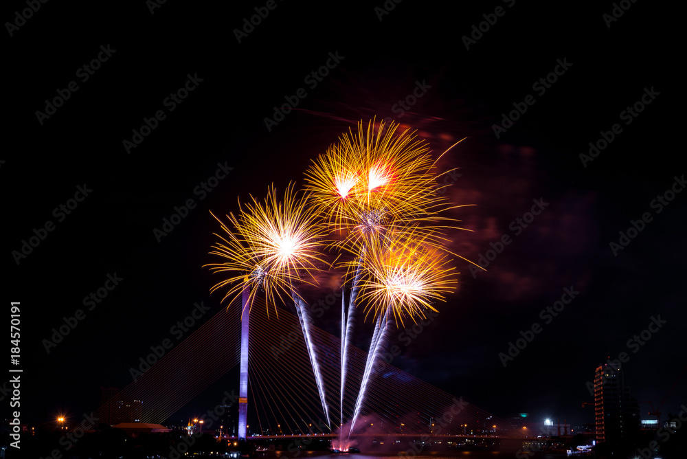 Beautiful colorful firework display for celebration happy new year and merry christmas in the night sky, bangkok city, thailand