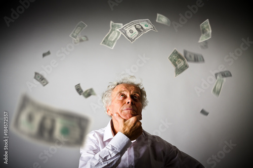 Old man in white and dollars.