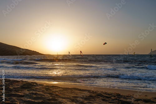 Kite surfers at sunset in Prasonisi, Rhodes
