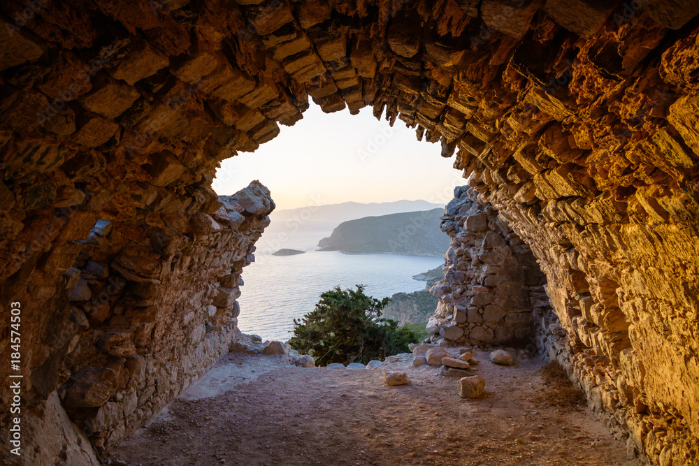 View from ruins of a church in Monolithos castle at sunset